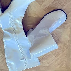 Whit go go boots very fun worn the for a 70’s party.